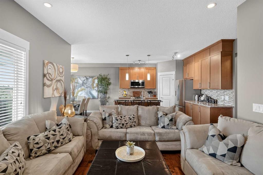 268 Rainbow Falls Green, Chestermere, AB - Indoor Photo Showing Living Room