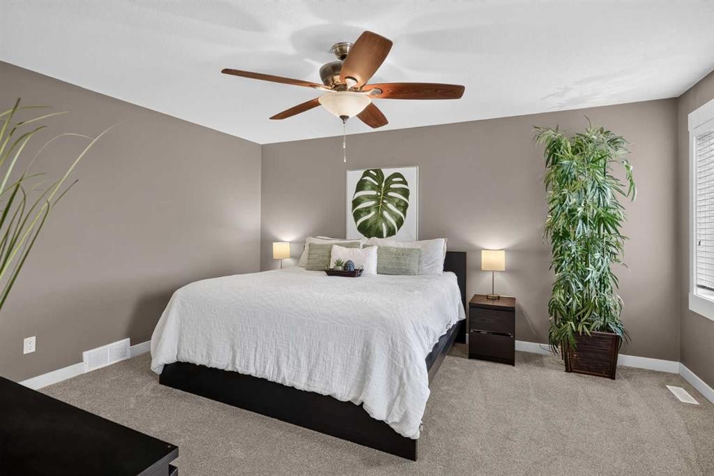 268 Rainbow Falls Green, Chestermere, AB - Indoor Photo Showing Bedroom