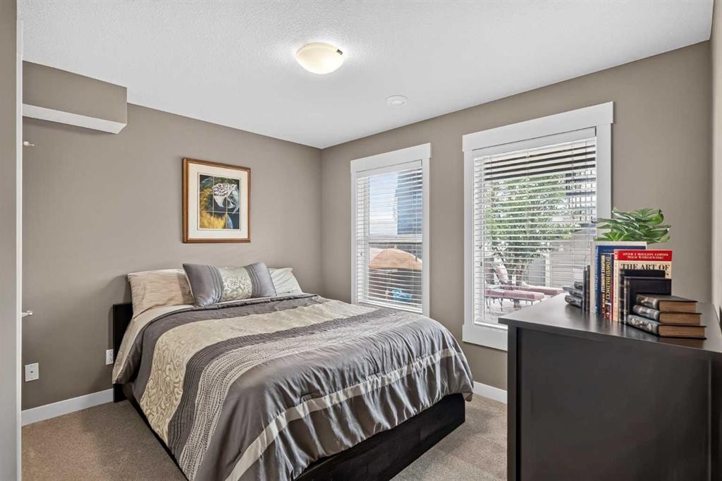268 Rainbow Falls Green, Chestermere, AB - Indoor Photo Showing Bedroom
