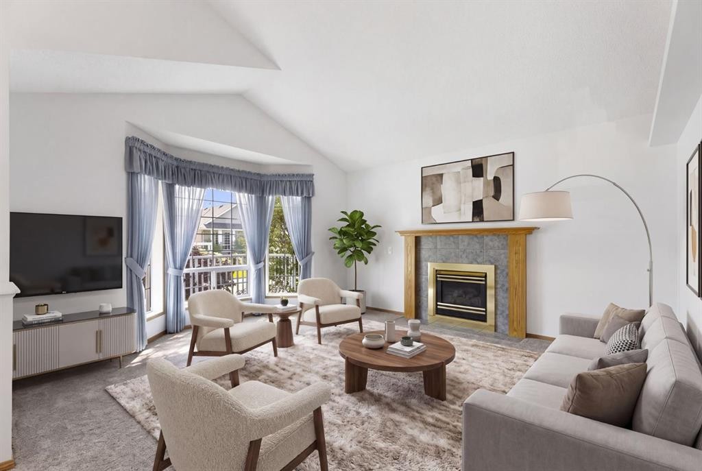 90 Martinridge Crescent Ne, Calgary, AB - Indoor Photo Showing Living Room With Fireplace