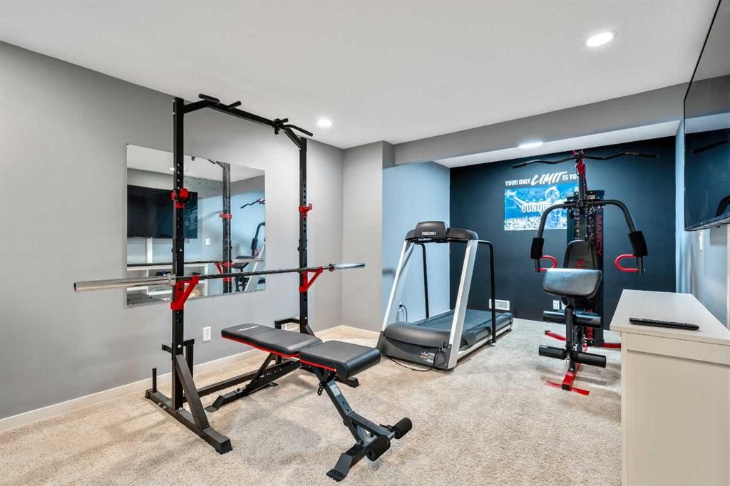 16 Brightoncrest Manor Se, Calgary, AB - Indoor Photo Showing Gym Room