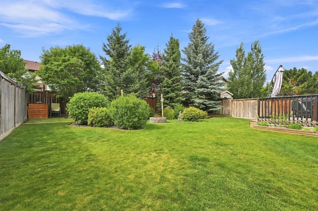 32 Tuscany Ravine Crescent Nw, Calgary, AB - Outdoor With Backyard