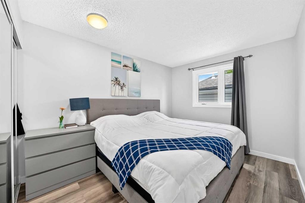 76 Aberfoyle Close Ne, Calgary, AB - Indoor Photo Showing Bedroom