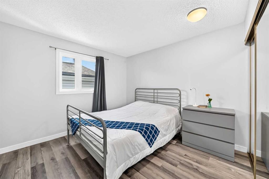 76 Aberfoyle Close Ne, Calgary, AB - Indoor Photo Showing Bedroom