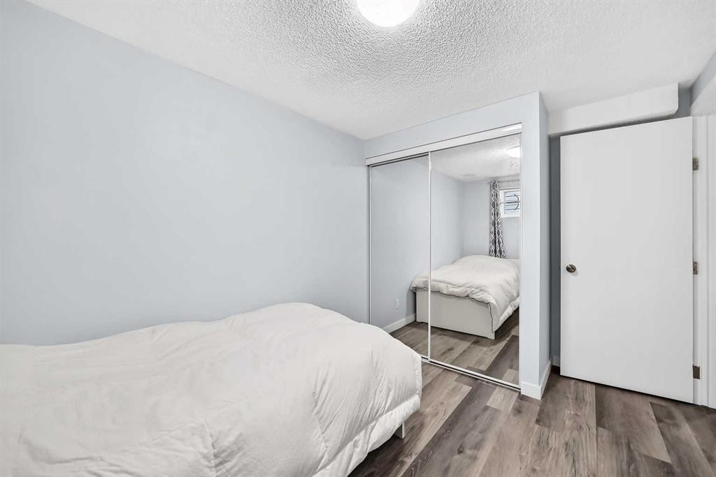 76 Aberfoyle Close Ne, Calgary, AB - Indoor Photo Showing Bedroom