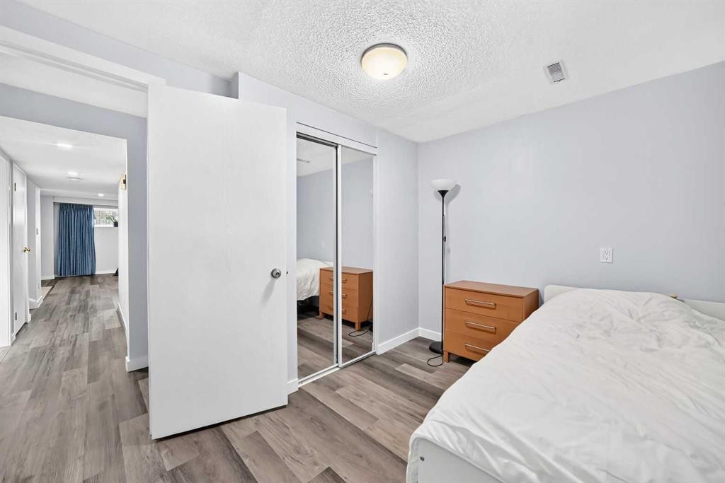 76 Aberfoyle Close Ne, Calgary, AB - Indoor Photo Showing Bedroom