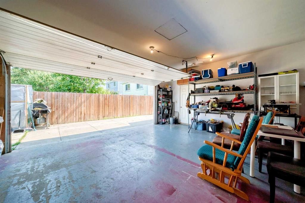 76 Aberfoyle Close Ne, Calgary, AB - Indoor Photo Showing Garage