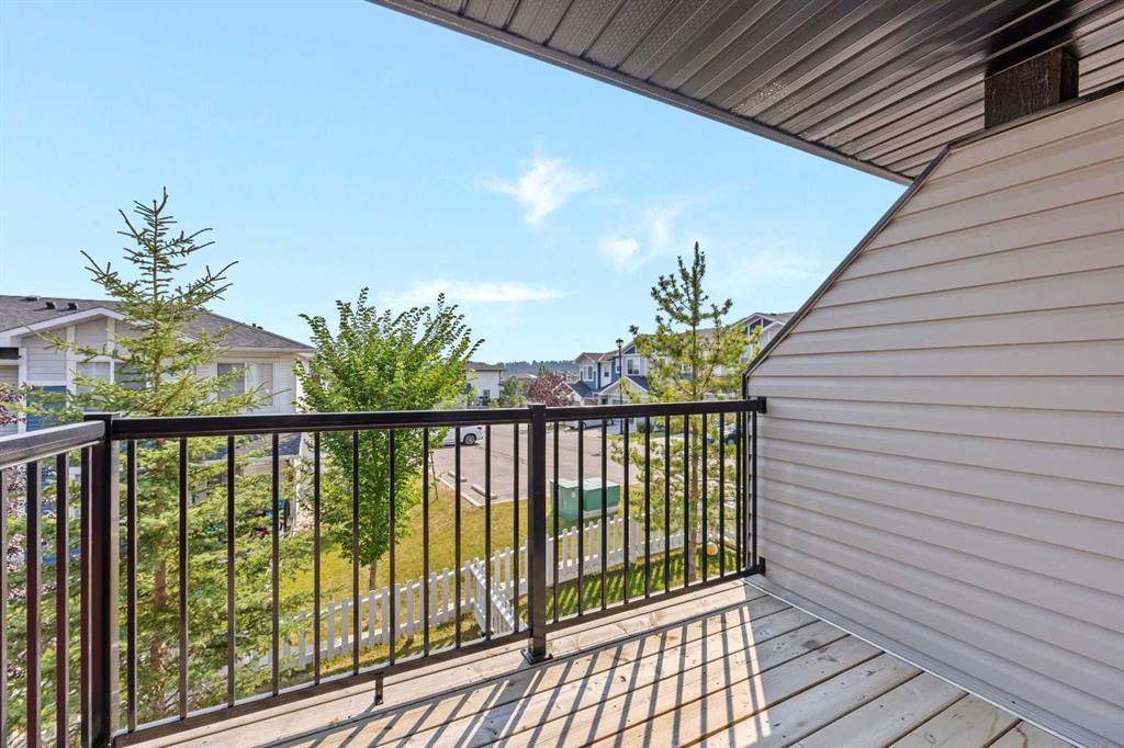 304 Jumping Pound Common, Cochrane, AB - Outdoor With Balcony With Exterior