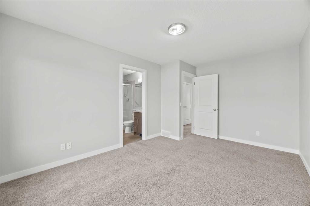 304 Jumping Pound Common, Cochrane, AB - Indoor Photo Showing Other Room