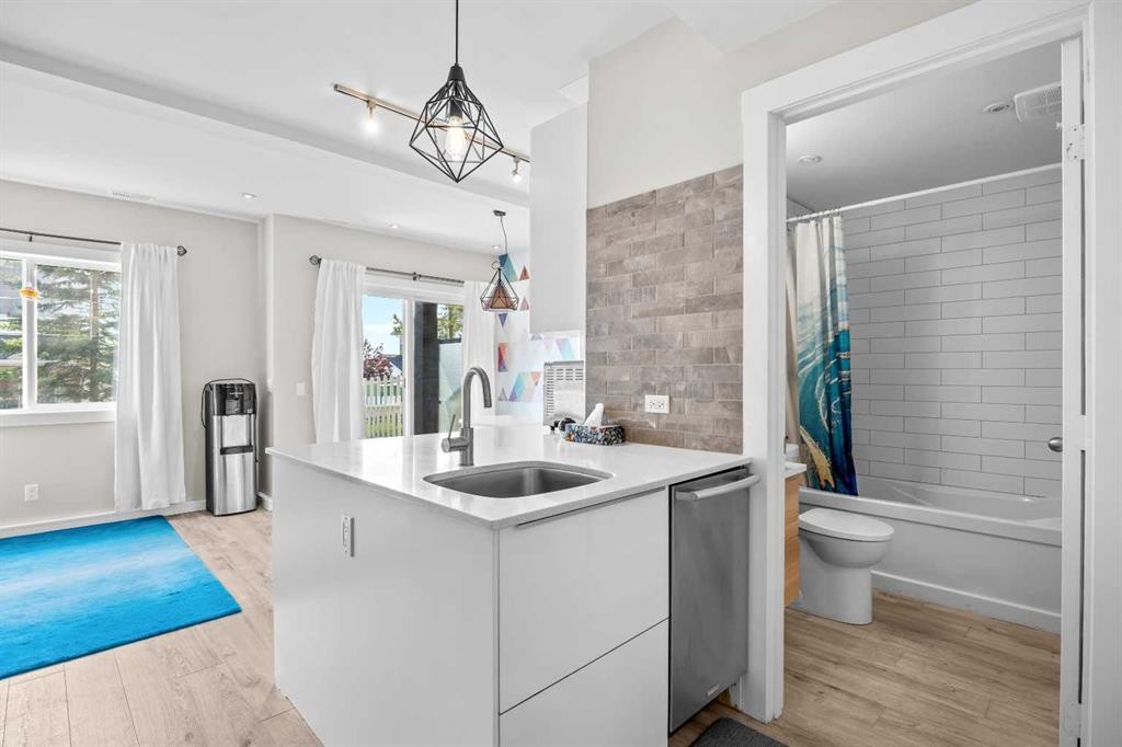 304 Jumping Pound Common, Cochrane, AB - Indoor Photo Showing Kitchen