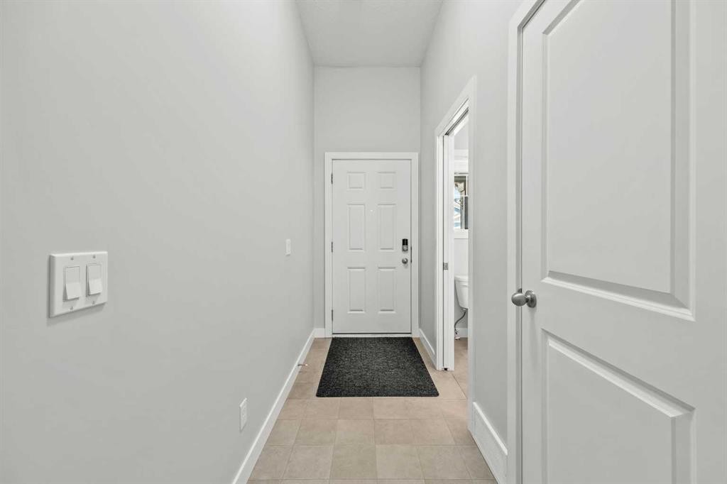 304 Jumping Pound Common, Cochrane, AB - Indoor Photo Showing Other Room
