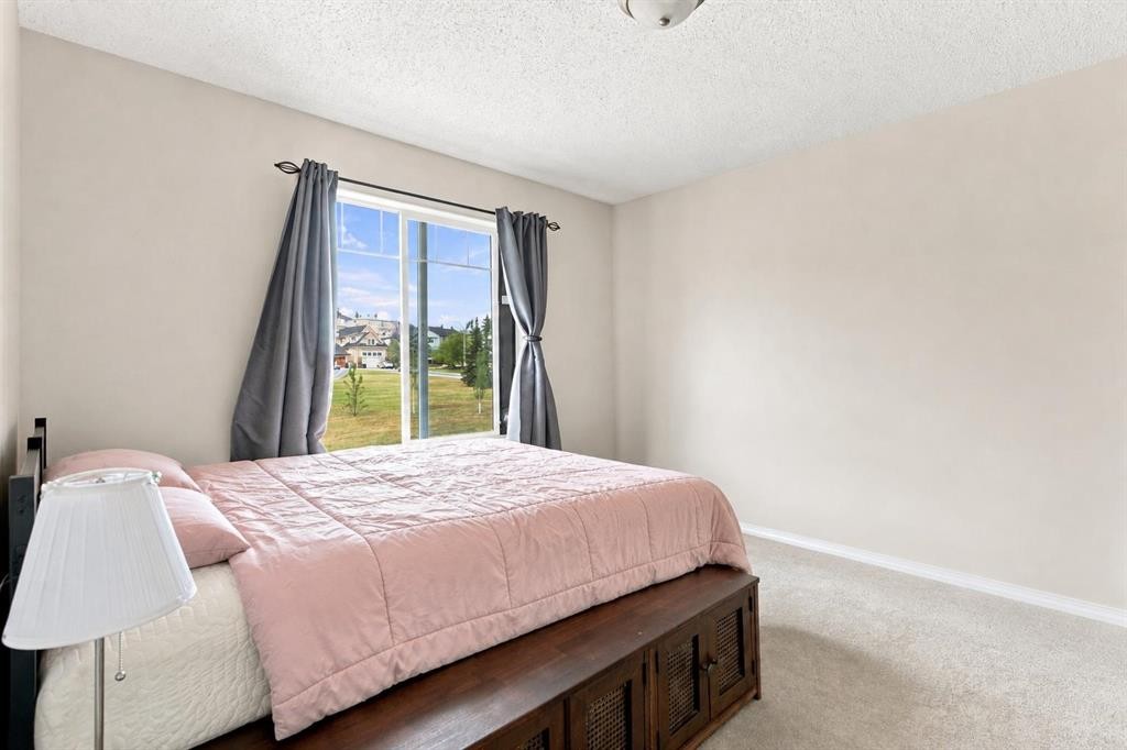 106 Panamount Drive Nw, Calgary, AB - Indoor Photo Showing Bedroom