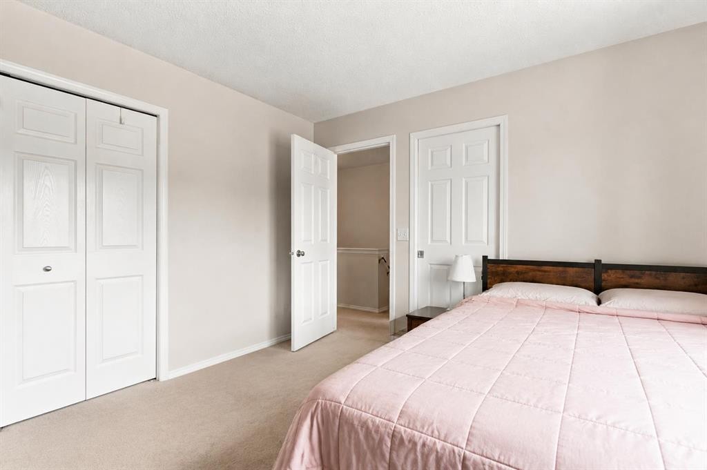 106 Panamount Drive Nw, Calgary, AB - Indoor Photo Showing Bedroom