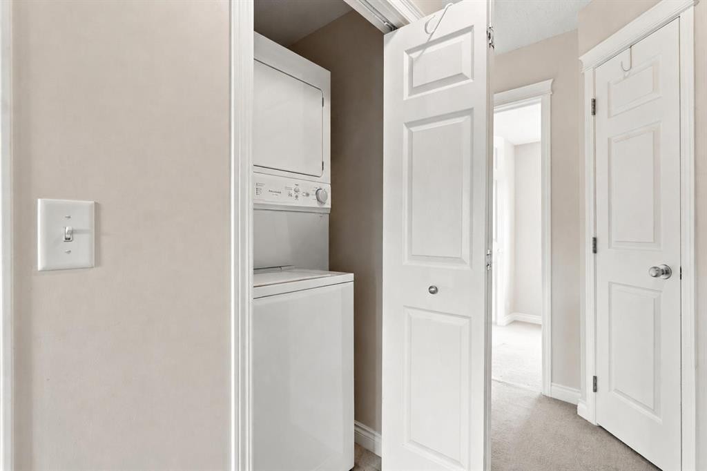 106 Panamount Drive Nw, Calgary, AB - Indoor Photo Showing Laundry Room