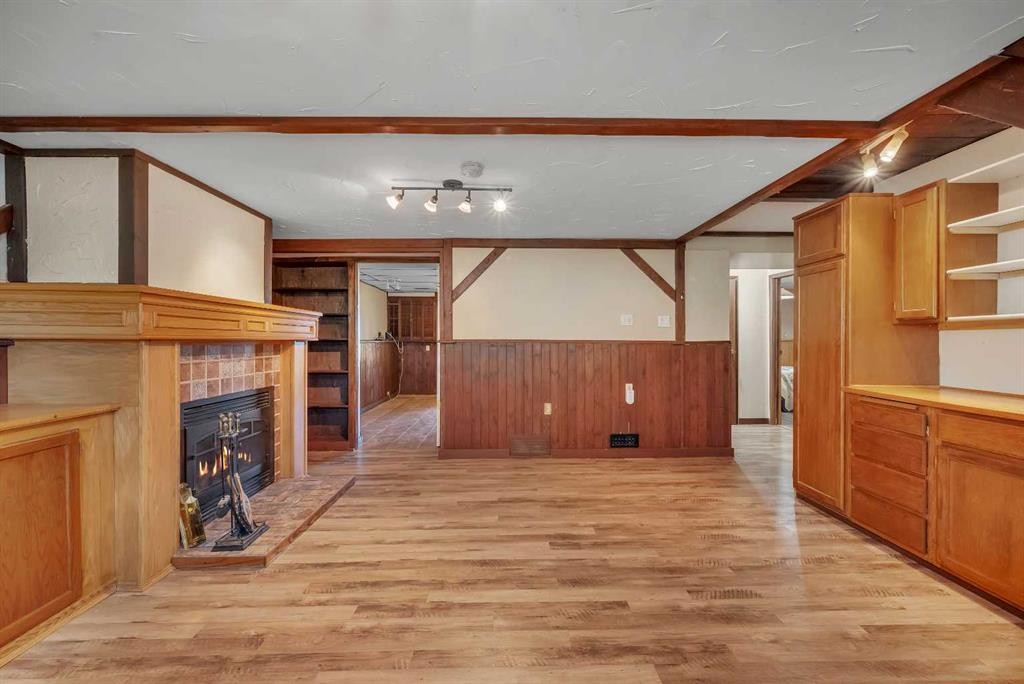 124 Macewan Drive Nw, Calgary, AB - Indoor Photo Showing Other Room With Fireplace