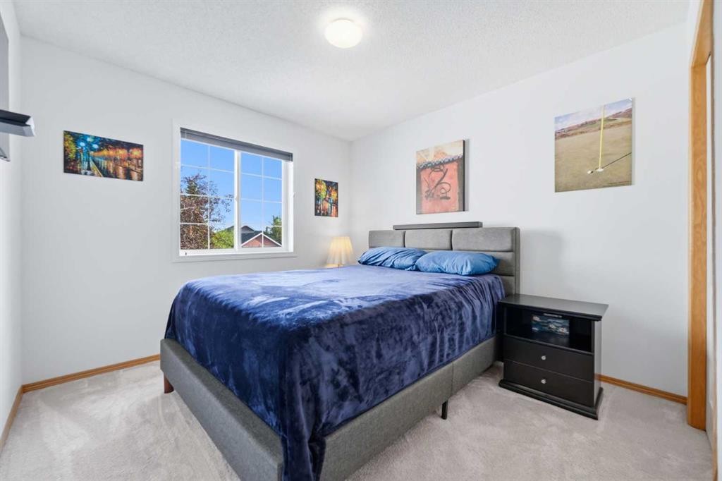 72 Arbour Crest Road Nw, Calgary, AB - Indoor Photo Showing Bedroom
