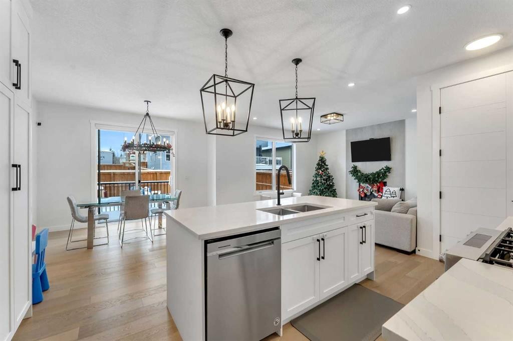 202 Kinniburgh Crescent, Chestermere, AB - Indoor Photo Showing Kitchen With Double Sink