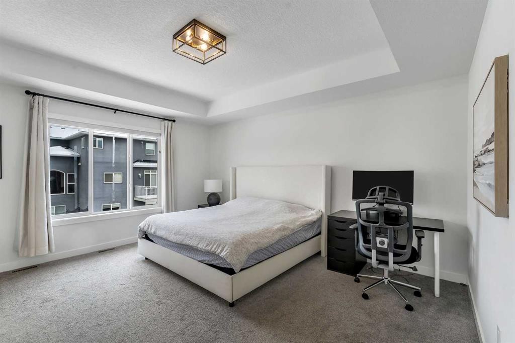 202 Kinniburgh Crescent, Chestermere, AB - Indoor Photo Showing Bedroom