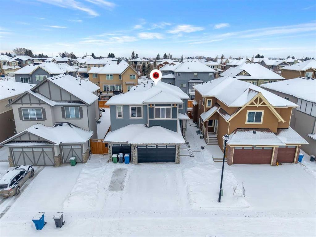 202 Kinniburgh Crescent, Chestermere, AB - Outdoor With Facade