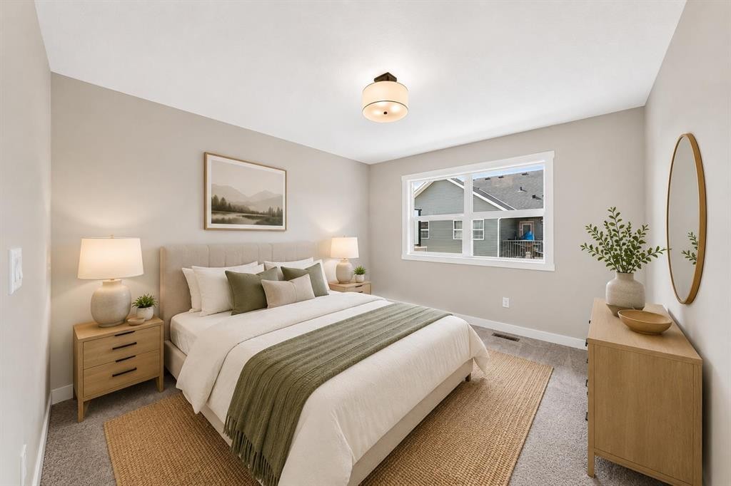1069 Bayview Crescent Sw, Airdrie, AB - Indoor Photo Showing Bedroom
