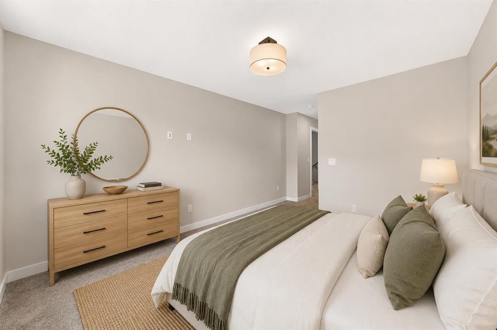 1069 Bayview Crescent Sw, Airdrie, AB - Indoor Photo Showing Bedroom