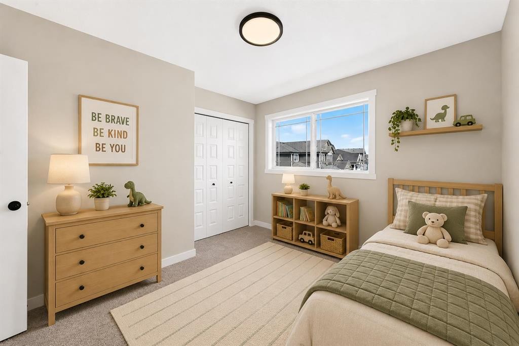 1069 Bayview Crescent Sw, Airdrie, AB - Indoor Photo Showing Bedroom