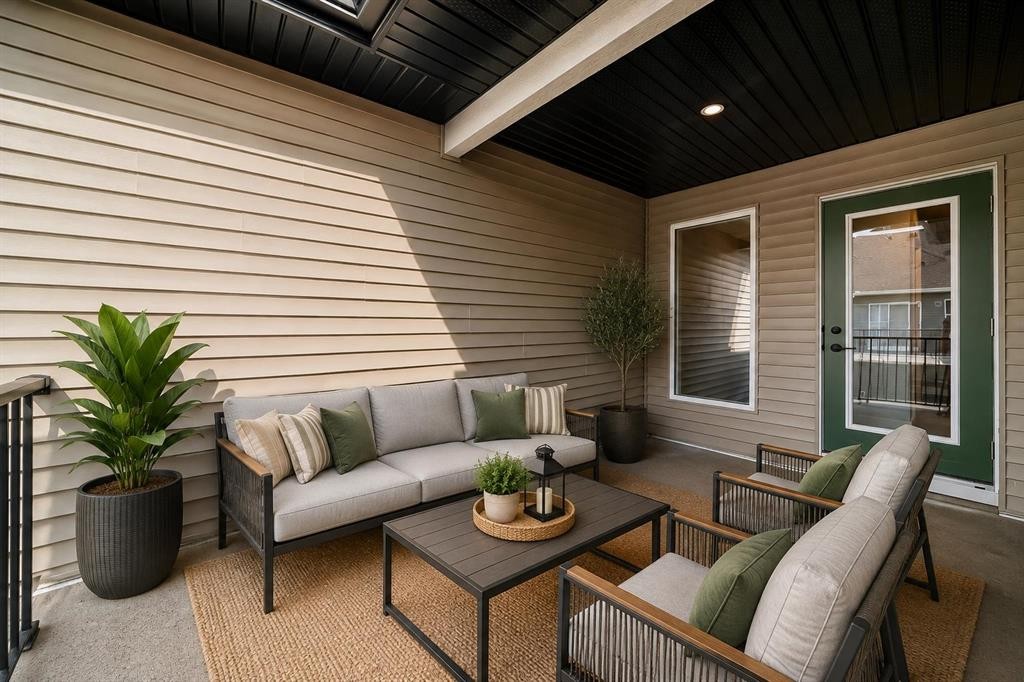 1069 Bayview Crescent Sw, Airdrie, AB - Outdoor With Deck Patio Veranda With Exterior