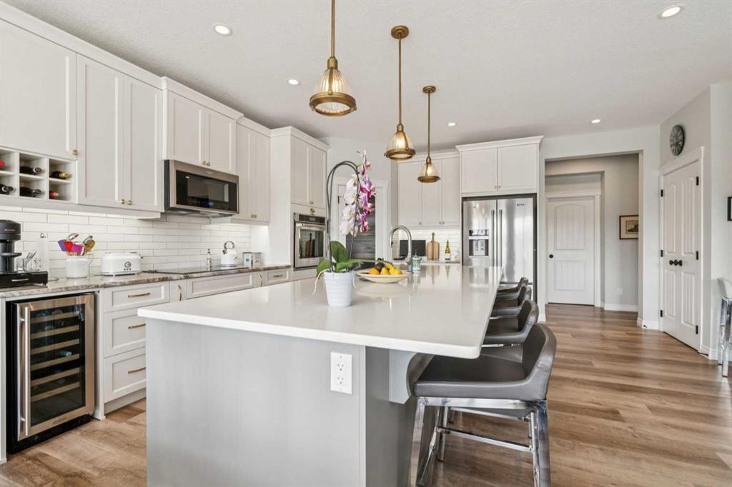 14 Riviera View, Cochrane, AB - Indoor Photo Showing Kitchen With Upgraded Kitchen