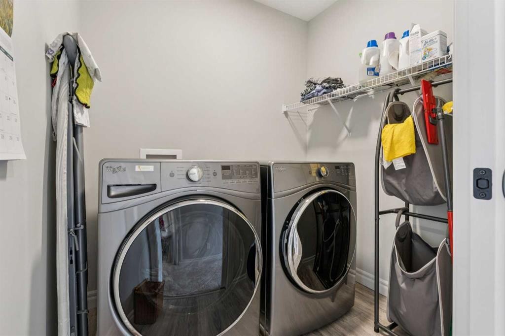 14 Riviera View, Cochrane, AB - Indoor Photo Showing Laundry Room