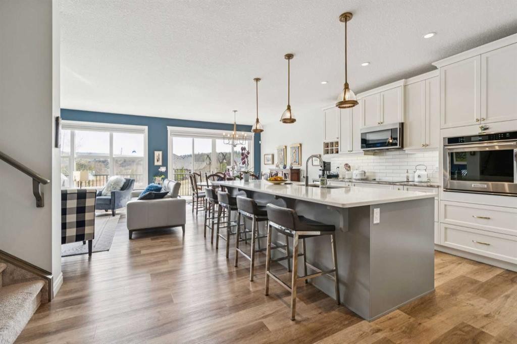 14 Riviera View, Cochrane, AB - Indoor Photo Showing Kitchen With Upgraded Kitchen