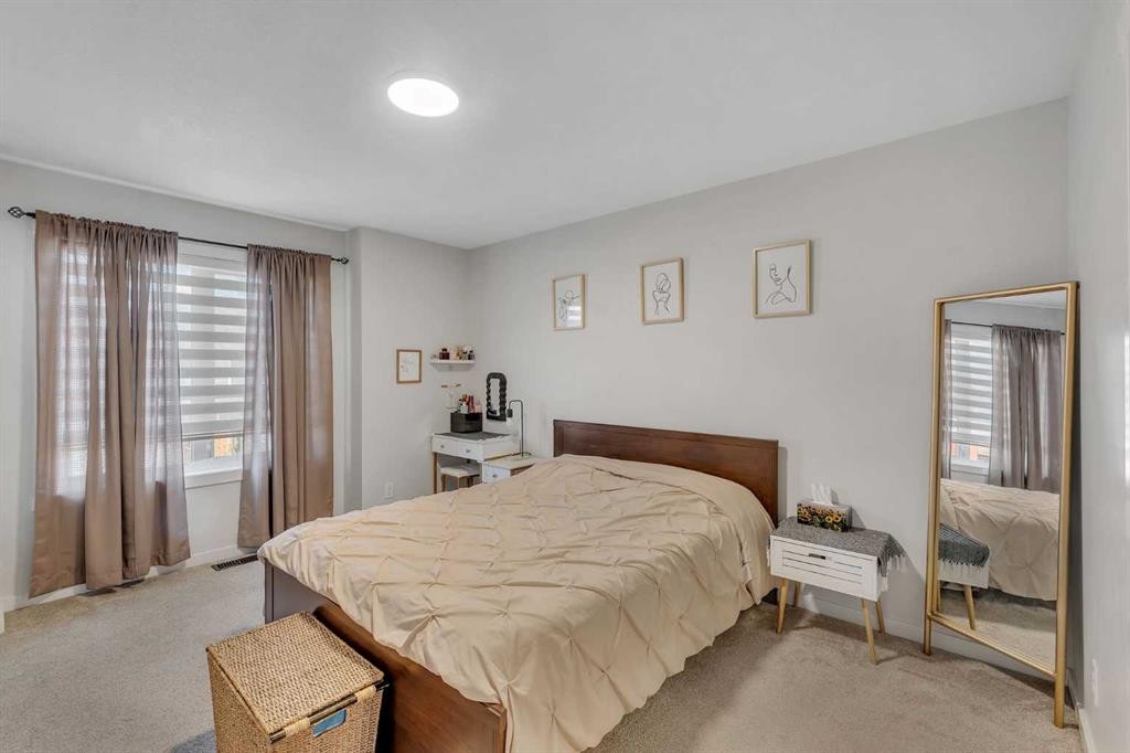 124-31 Red Embers Parade Ne, Calgary, AB - Indoor Photo Showing Bedroom
