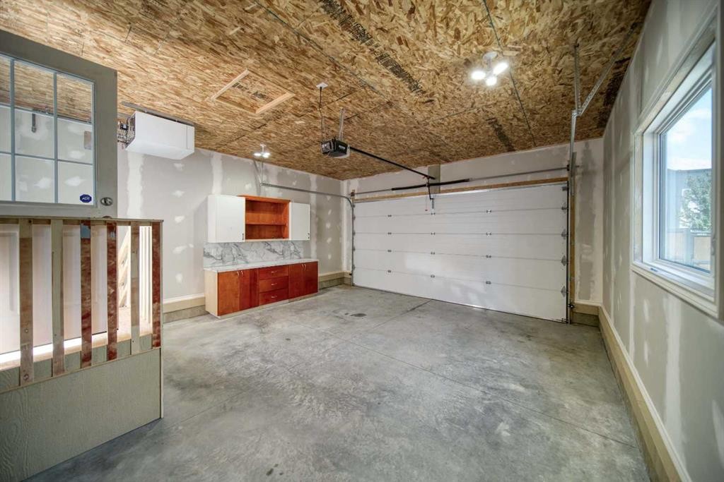 329 Springmere Way, Chestermere, AB - Indoor Photo Showing Garage