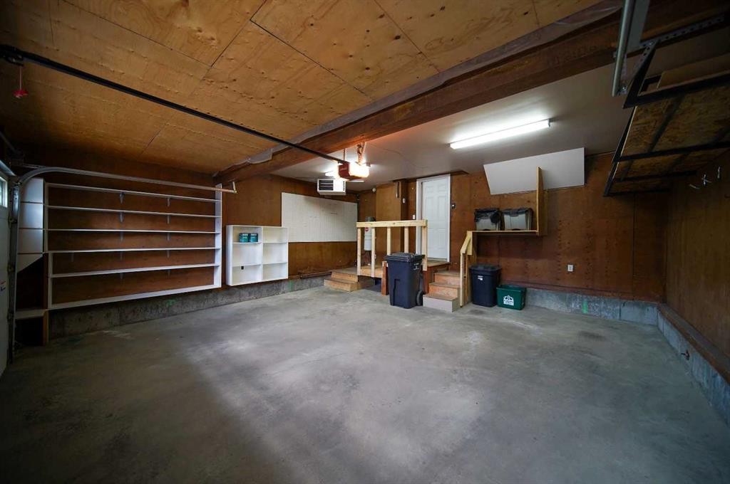 329 Springmere Way, Chestermere, AB - Indoor Photo Showing Garage