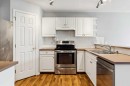 33 Chaparral Ridge Terrace Se, Calgary, AB  - Indoor Photo Showing Kitchen With Double Sink 