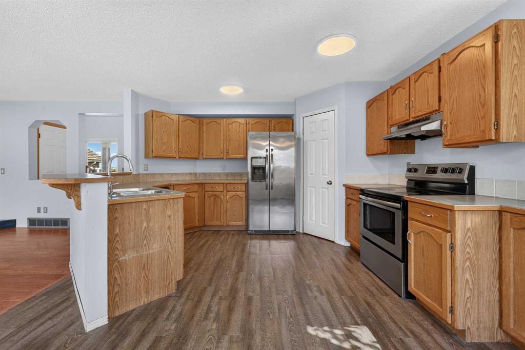 446 Harvest Hills Drive Ne, Calgary, AB - Indoor Photo Showing Kitchen With Stainless Steel Kitchen