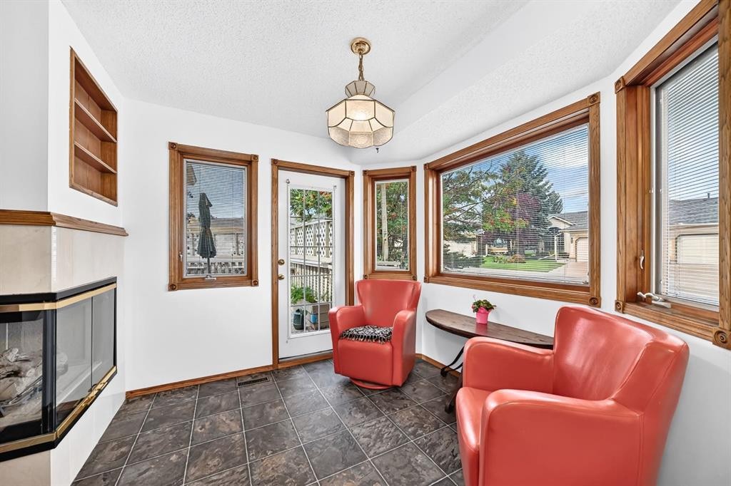 8 Sunlake Close Se, Calgary, AB - Indoor With Fireplace