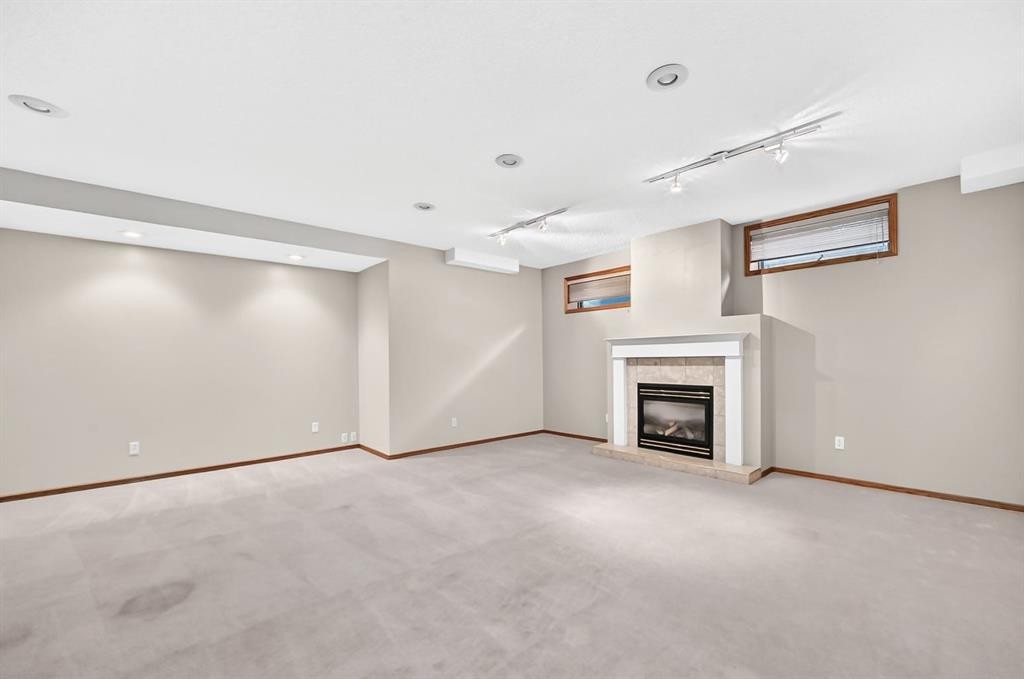8 Sunlake Close Se, Calgary, AB - Indoor With Fireplace