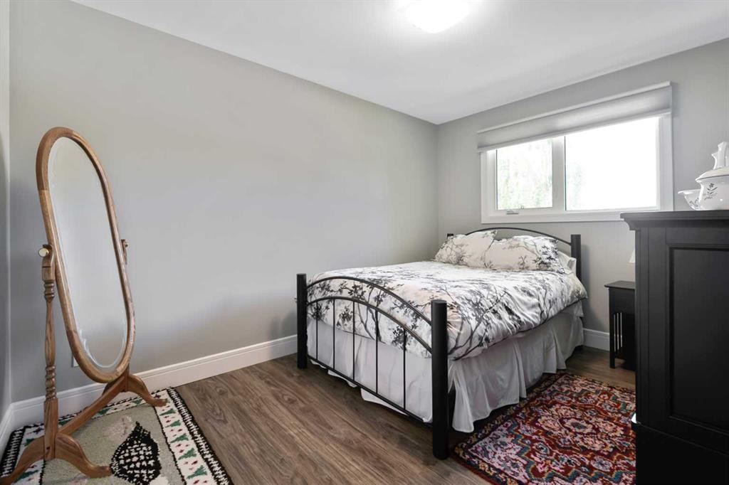 315 Woodpark Place Sw, Calgary, AB - Indoor Photo Showing Bedroom