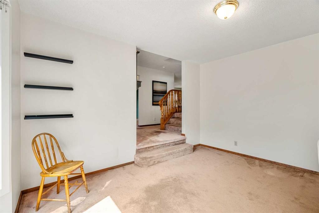 84 Deermoss Crescent Se, Calgary, AB - Indoor Photo Showing Other Room