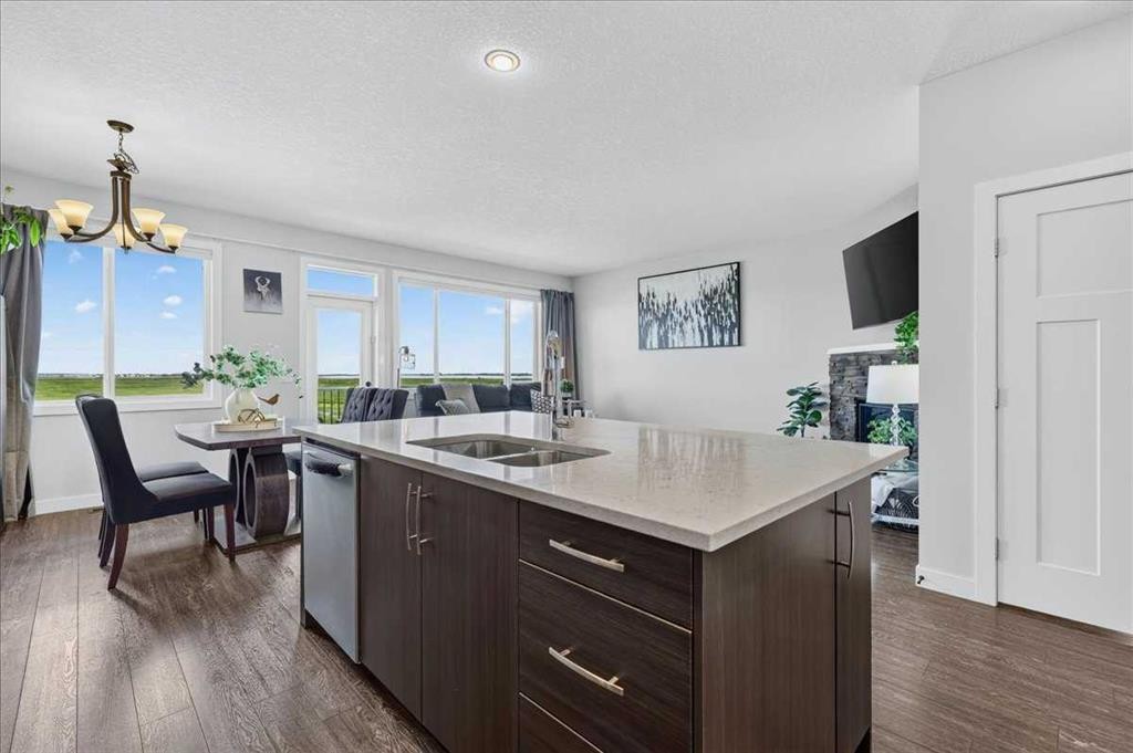 61 Hanson Lane Ne, Langdon, AB - Indoor Photo Showing Kitchen With Double Sink
