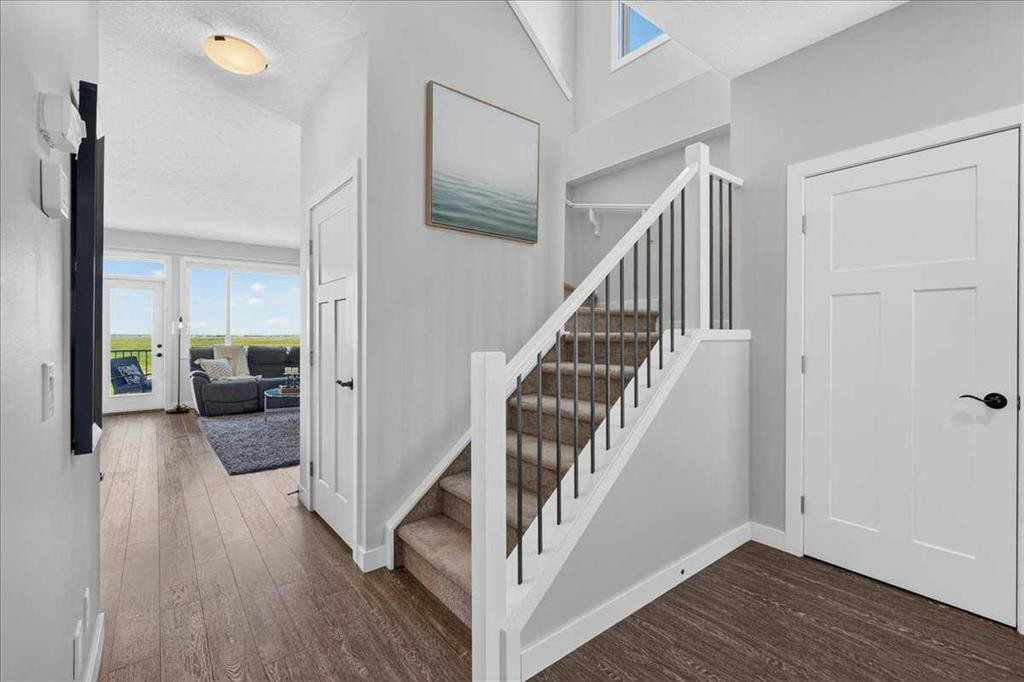 61 Hanson Lane Ne, Langdon, AB - Indoor Photo Showing Other Room