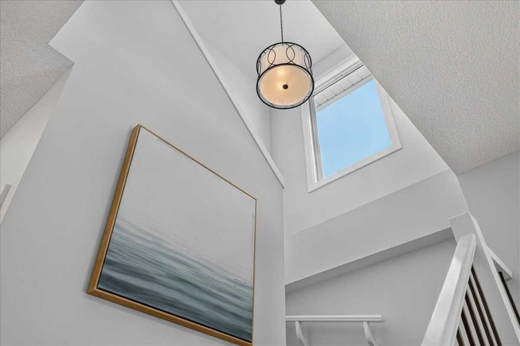 61 Hanson Lane Ne, Langdon, AB - Indoor Photo Showing Other Room