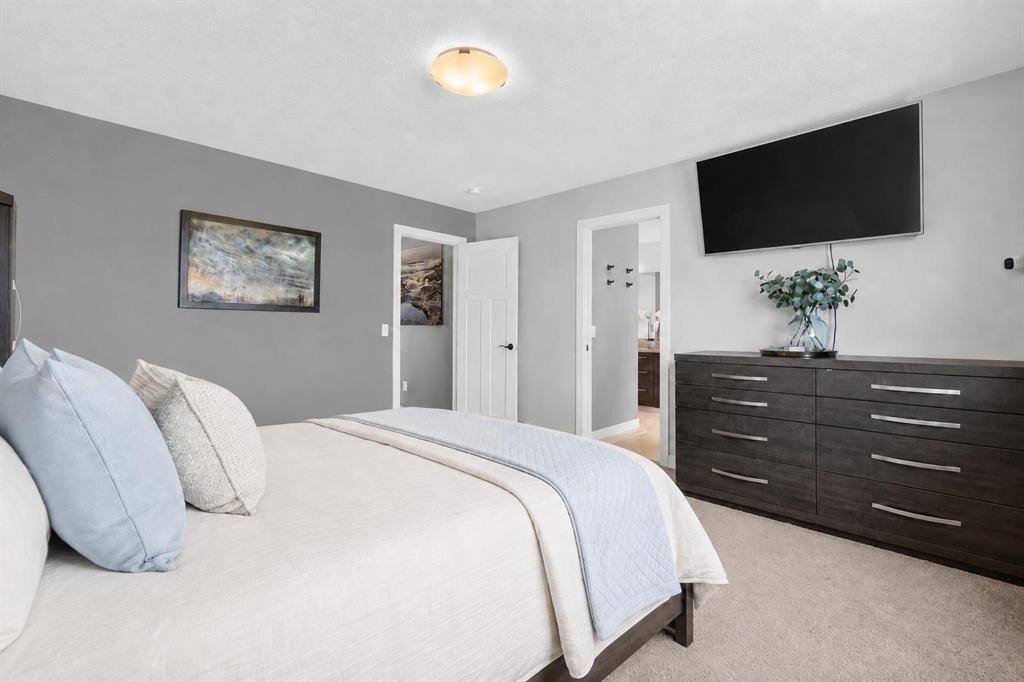 61 Hanson Lane Ne, Langdon, AB - Indoor Photo Showing Bedroom