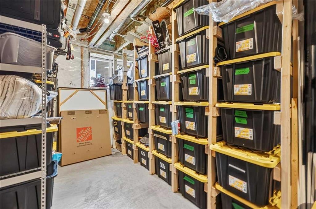 61 Hanson Lane Ne, Langdon, AB - Indoor With Storage