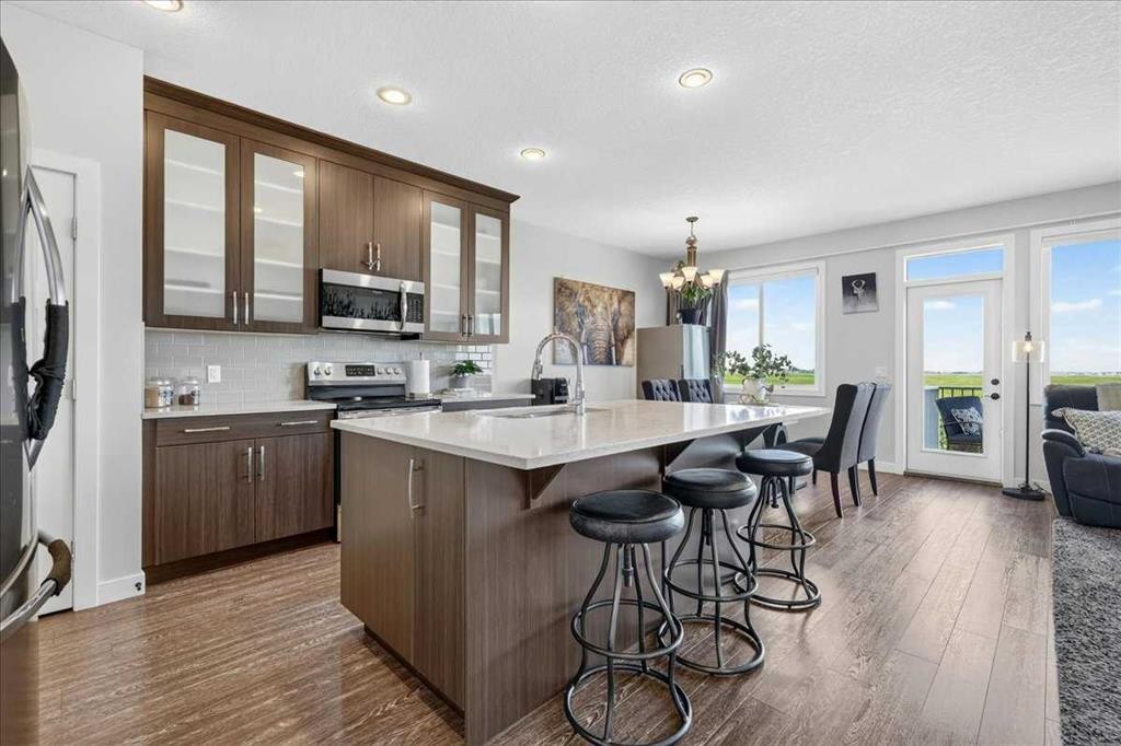 61 Hanson Lane Ne, Langdon, AB - Indoor Photo Showing Kitchen With Upgraded Kitchen
