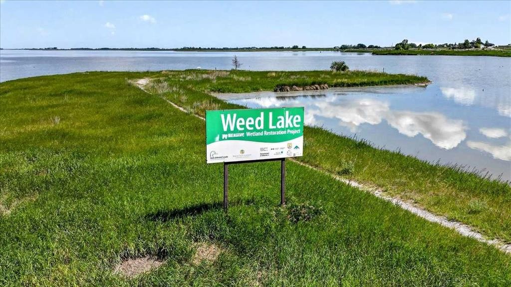 61 Hanson Lane Ne, Langdon, AB - Outdoor With Body Of Water With View