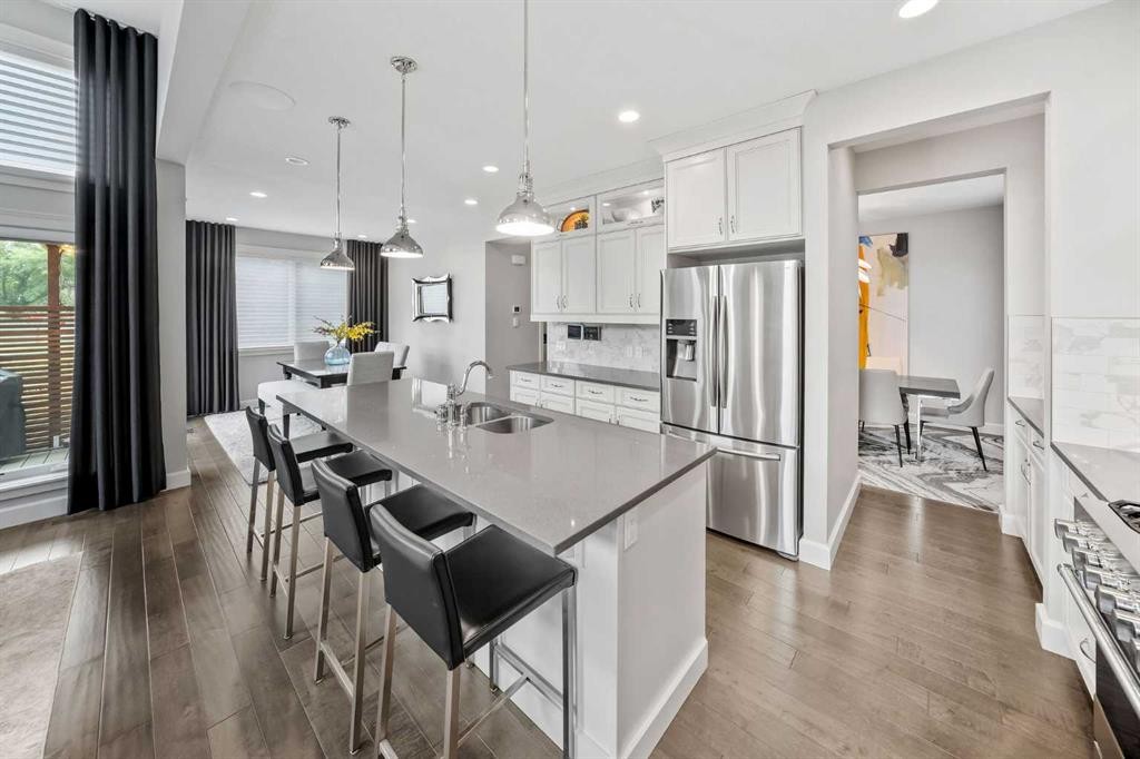 656 Quarry Way Se, Calgary, AB - Indoor Photo Showing Kitchen With Double Sink With Upgraded Kitchen