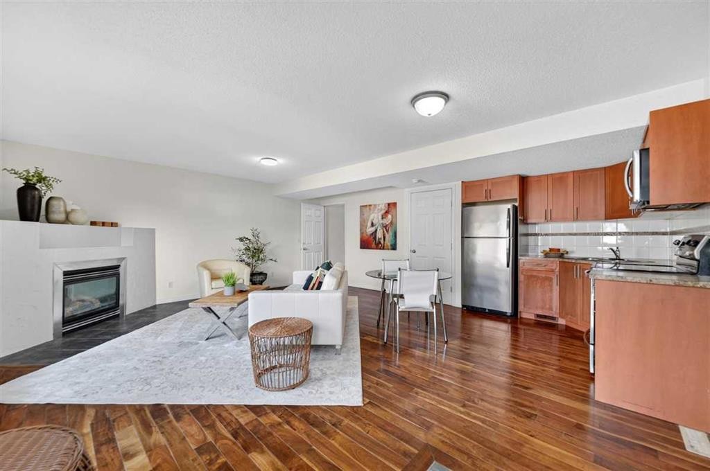 307 Covehaven View Ne, Calgary, AB - Indoor With Fireplace