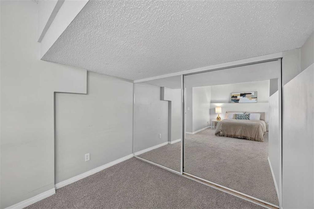 307 Covehaven View Ne, Calgary, AB - Indoor Photo Showing Bedroom