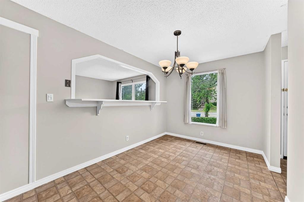 19 Falshire Drive Ne, Calgary, AB - Indoor Photo Showing Other Room